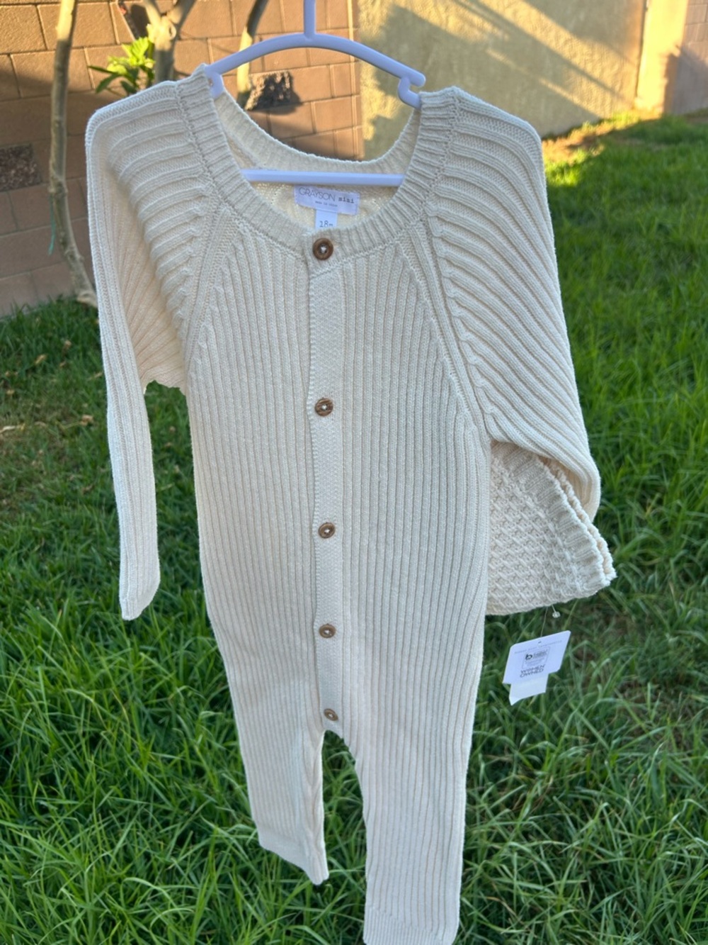 Cream Ribbed Button-Front Knit Romper